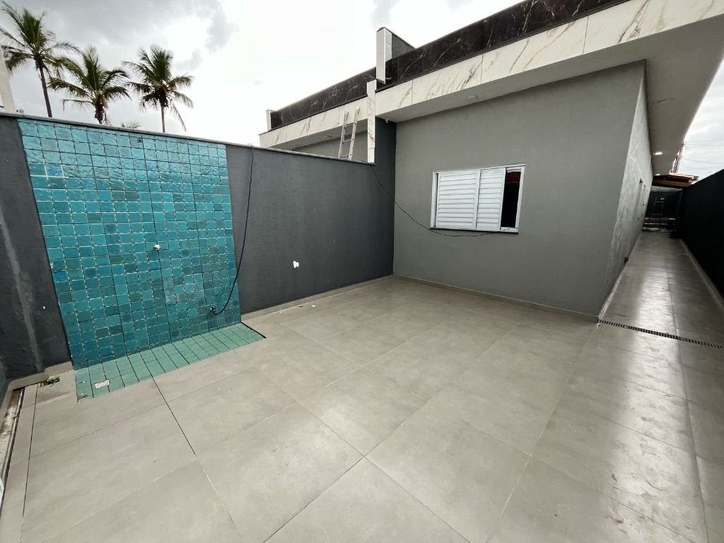 Casa com 3 dormitórios e piscina à venda, 78 m² por R$ 585.000 - Jardim Suarão - Itanhaém/SP
