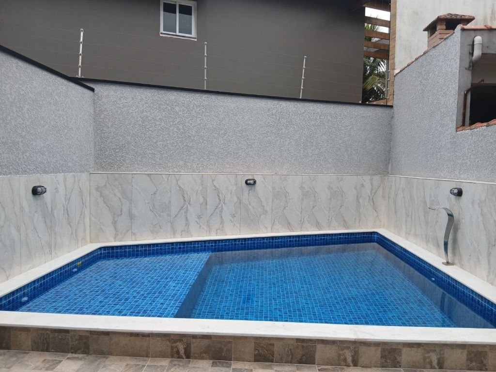 Sobrado com 3 dormitórios à venda, 117 m² por R$ 699.000 - Vila Leopoldina - Itanhaém/SP